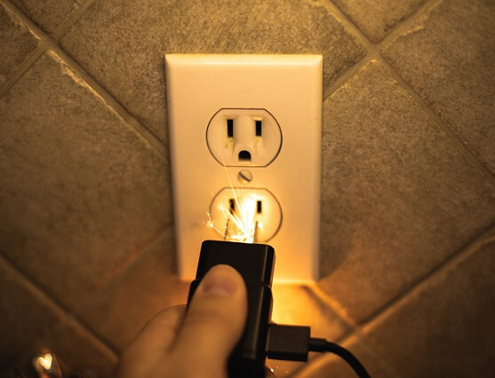 plug sparking when plugged in is an electrical emergency