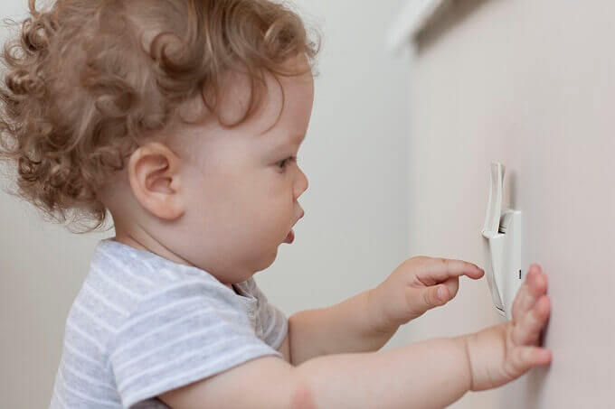 toddler with electrical plug electrical safety for kdis